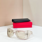 YSL sunglasses with clear frames and tinted lenses, with black case