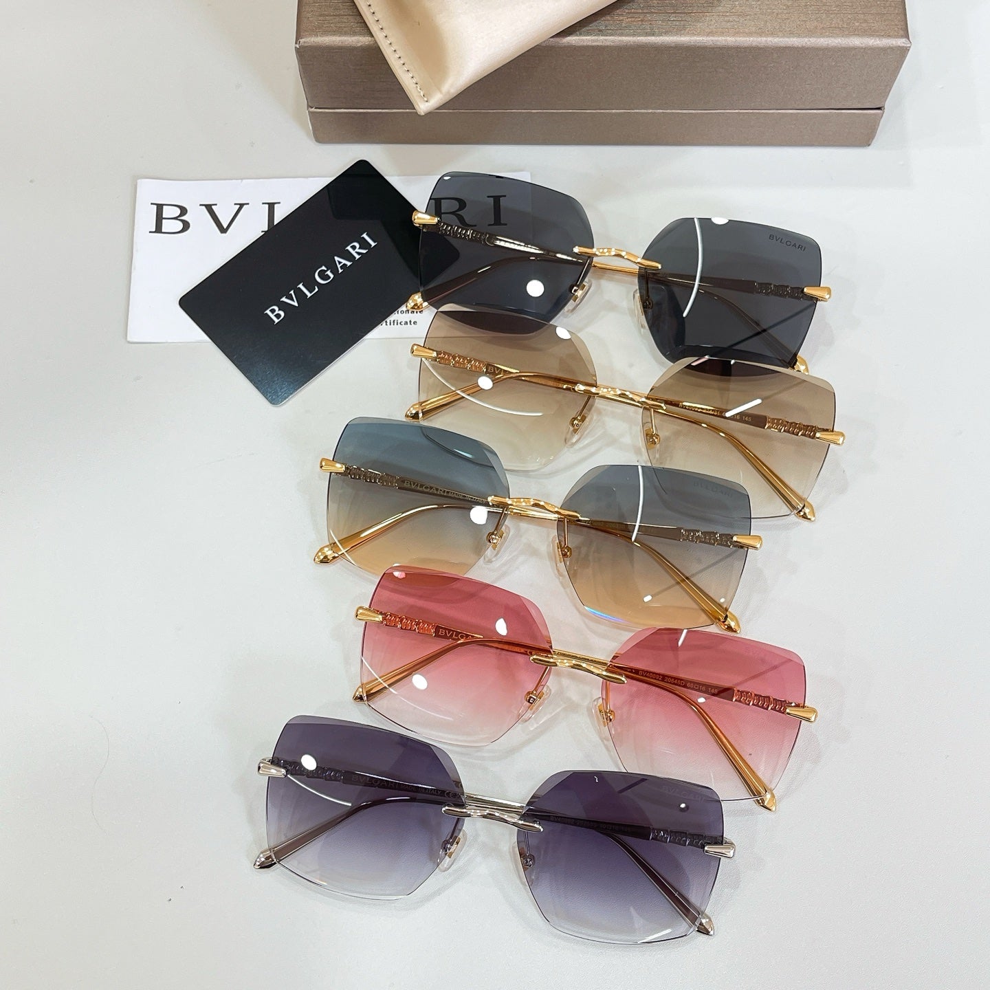 Bvlgari sunglasses assortment with multiple lens colors and gold-tone frames