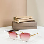 Gold-tone sunglasses with pink tinted lenses and thin rectangular frames