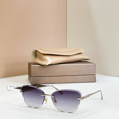Gold-tone sunglasses with purple tinted lenses and thin rectangular frames