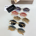 Set of Bvlgari sunglasses with mixed tinted lenses and gold metal frames