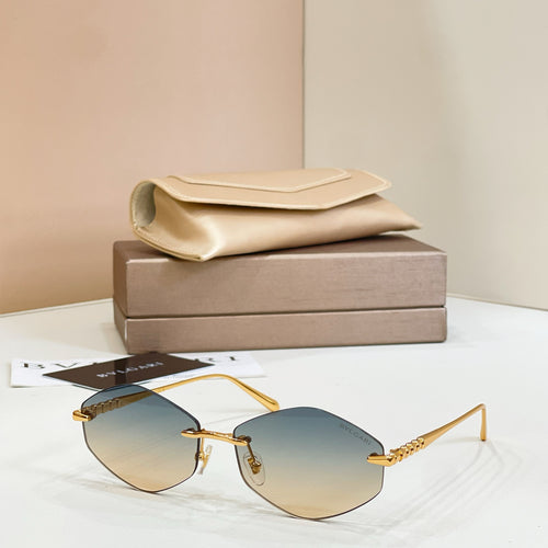 Bvlgari sunglasses with gold metal frame and blue tinted round lenses