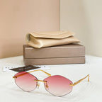 Bvlgari sunglasses with gold metal frame and red tinted round lenses
