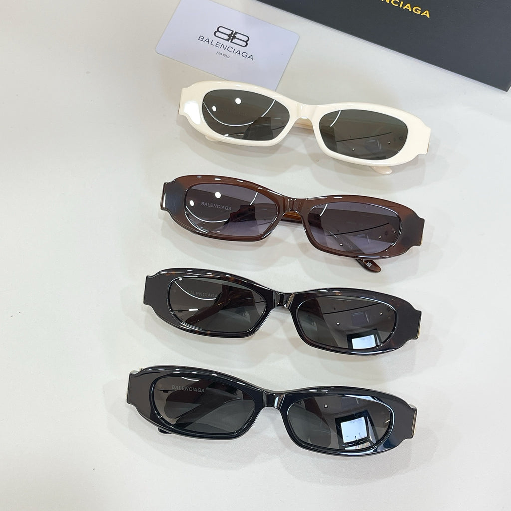 Balenciaga assorted sunglasses with white, brown, and black frames and dark lenses