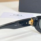 Balenciaga black sunglasses side arm with gold-tone hinge and engraved markings
