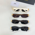 Balenciaga sunglasses set with cream, tortoiseshell, and black frames and dark lenses