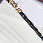 Gucci sunglasses, navy temple with gold-tone chain and rivet accents