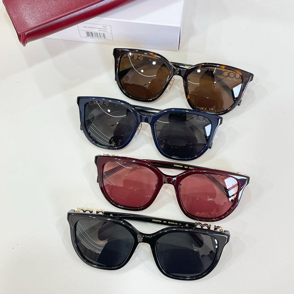 Gucci glasses set of four pairs: brown, navy, burgundy, and black frames
