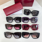 Gucci sunglasses assortment with red case, showing multiple colored tinted frames.