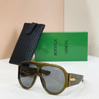Sunglasses with dark olive frames and dark lenses, plus black textured case
