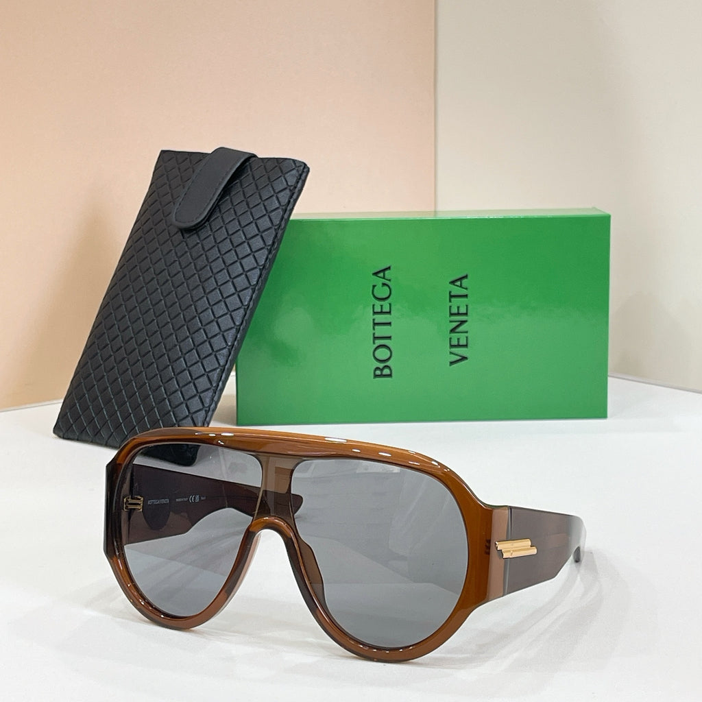 Sunglasses with brown frames and dark lenses, plus black textured case