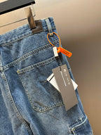 Dior pants, light blue denim with back pocket and hanging product tags
