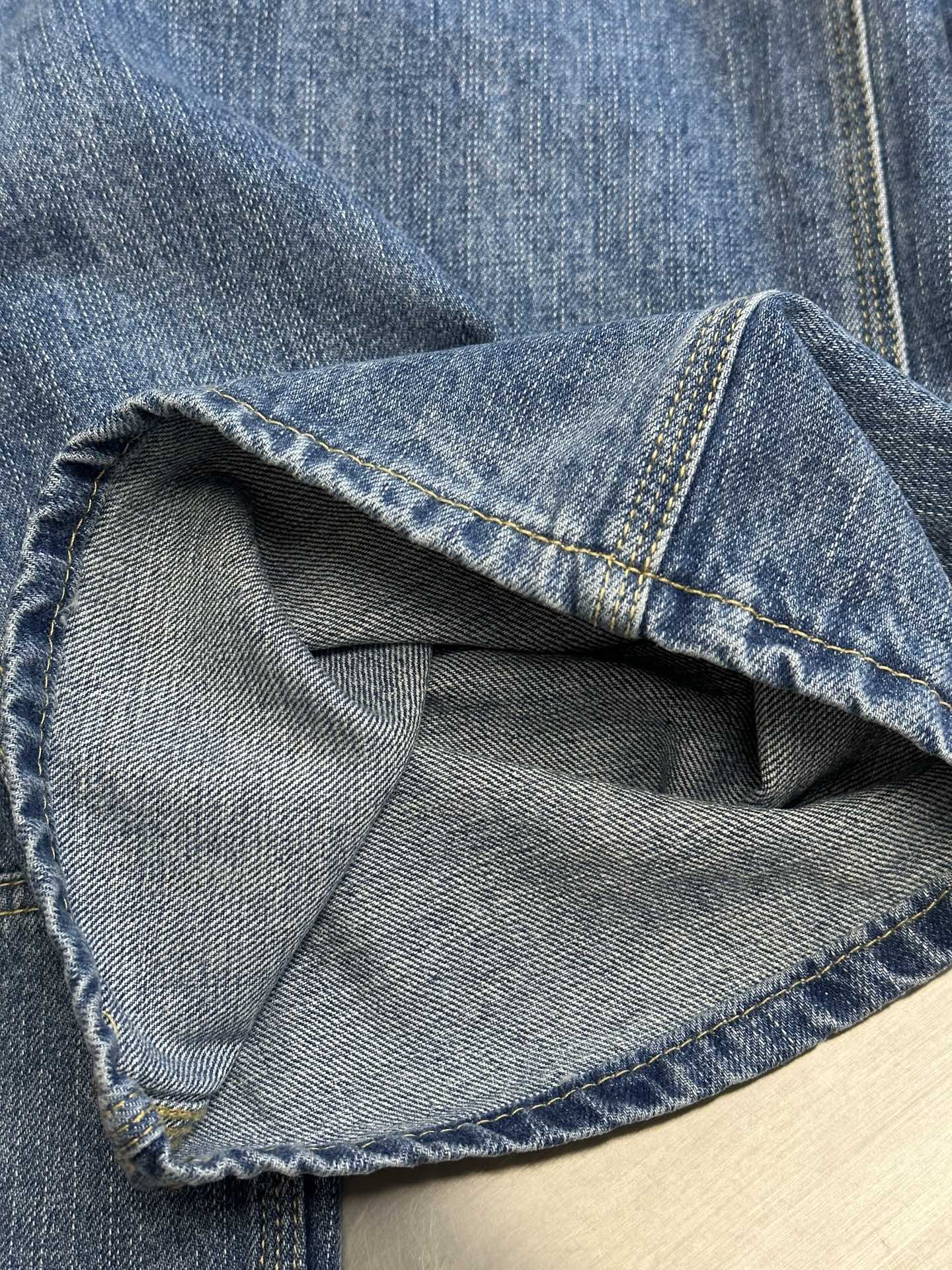 Dior pants, denim pocket opening with light gray inner lining