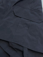 Navy cargo shorts with stitched flap pocket and side seam details