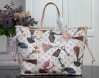 Louis Vuitton tote bag with multicolor motif print and leather handles