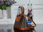 Louis Vuitton monogram bucket bag with brown leather drawstring and strap