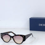 Dior cat-eye sunglasses with tortoiseshell frames and light pink tint lenses