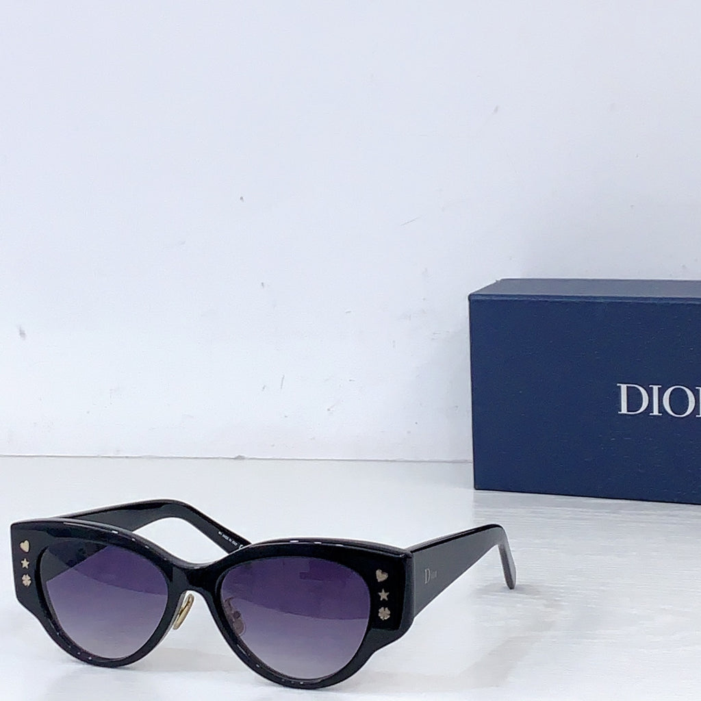 Dior cat-eye sunglasses with black frames and purple tint lenses