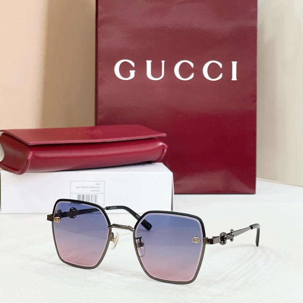 Gucci square sunglasses with black frame, pink gradient lenses, and gold-tone temples.