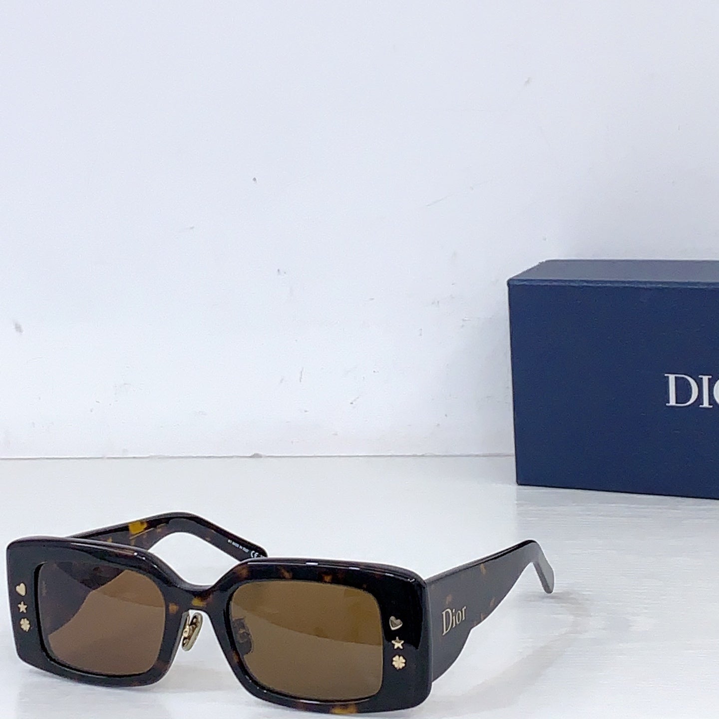Dior square sunglasses with tortoiseshell frame and brown-tinted lenses