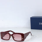 Dior square sunglasses with dark burgundy frame and rose-tinted lenses