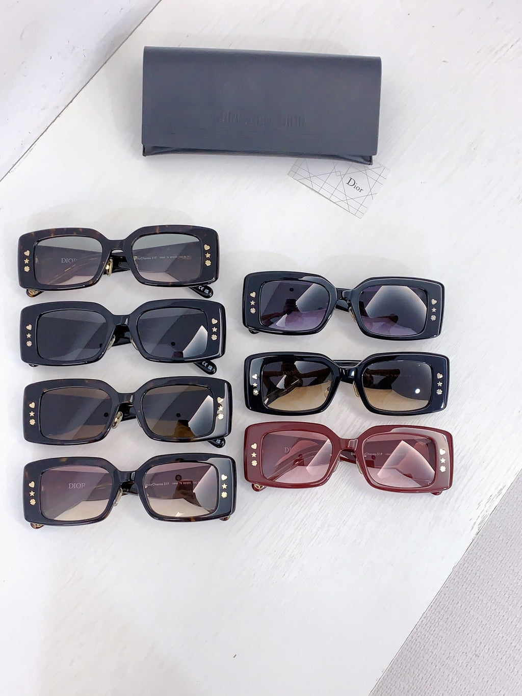 Dior sunglasses set with multiple square frames and tinted lenses, shown together