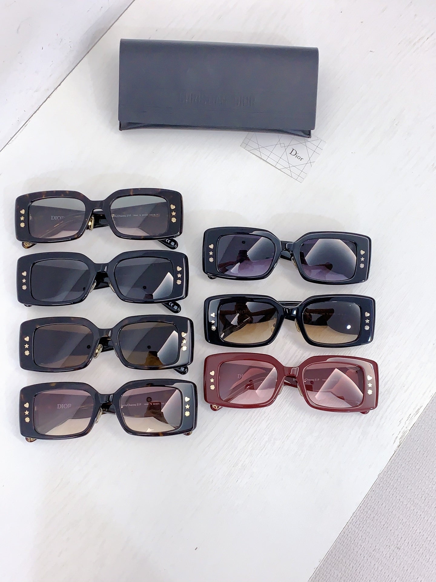 Dior sunglasses set with multiple square frames and tinted lenses, shown together