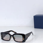 Dior square sunglasses with tortoiseshell frame and green-tinted lenses