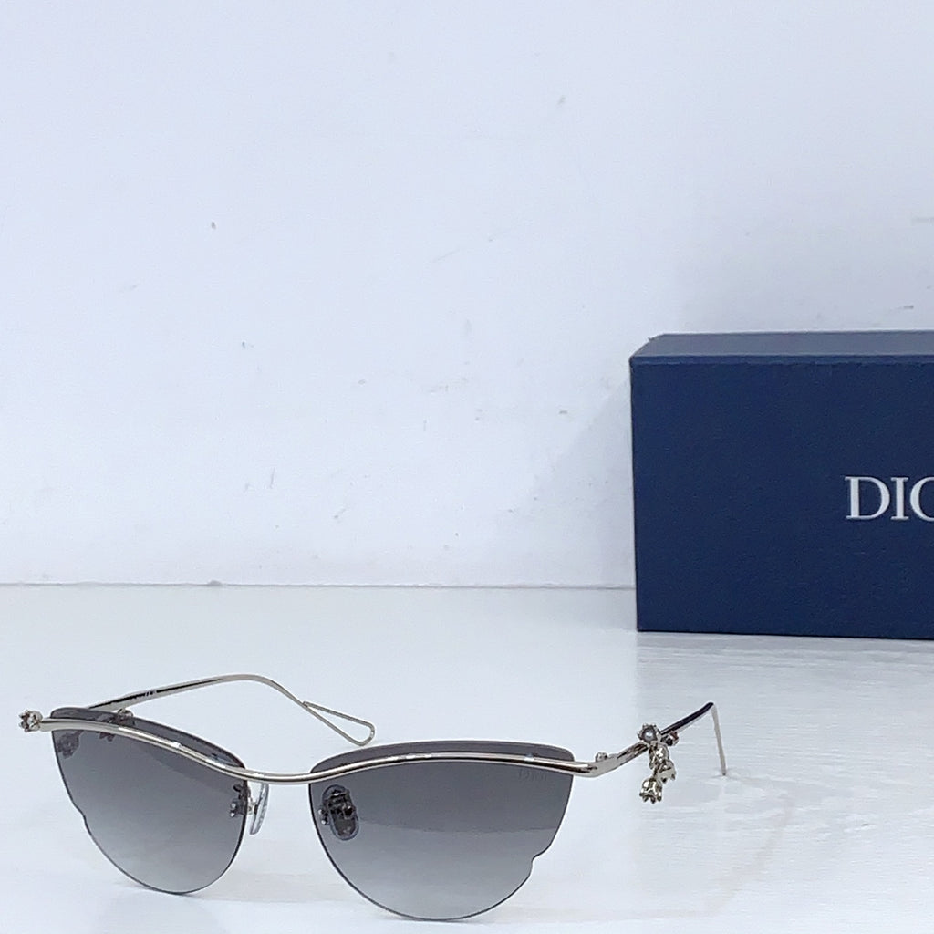 Dior sunglasses with silver-tone frame and dark gray tinted lenses