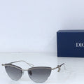 Dior sunglasses with silver-tone frame and dark gray tinted lenses
