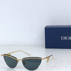 Dior sunglasses with gold-tone frame and dark gray tinted lenses