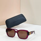 Square sunglasses with burgundy frames and brown tinted lenses, gold hinge detail