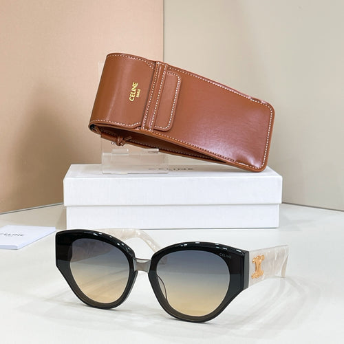 Cat-eye black sunglasses with gold Celine logo and dark tinted lenses