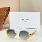 Gold-tone round sunglasses with dark lenses and black temple arms
