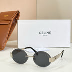 Gold-tone round sunglasses with black lenses and dark temple arms