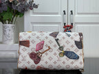 Louis Vuitton monogram tote handbag with top handles and front zipper closure