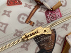 Louis Vuitton zipper pull and track with gold hardware on monogram handbag