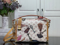 Louis Vuitton handbag with monogram print, tan leather trim, and gold-tone hardware