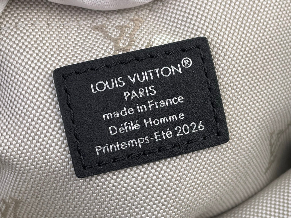 Handbag label reading LOUIS VUITTON PARIS made in France