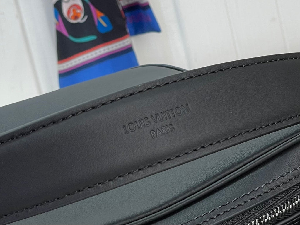 Louis Vuitton “PARIS” embossing on dark black strap with stitched edge