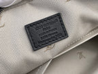 Louis Vuitton bag label patch on light patterned fabric lining