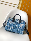 Blue and white checkered handbag with top handles and navy crossbody strap