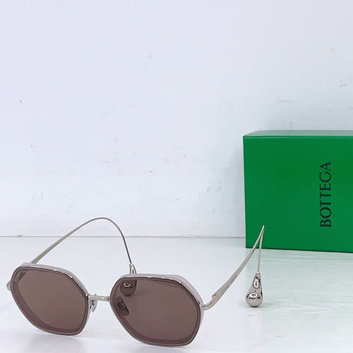 Bottega Veneta sunglasses with brown tinted lenses and light metal frame