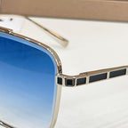 Bvlgari square sunglasses close-up: gold-tone frame with black geometric inlays