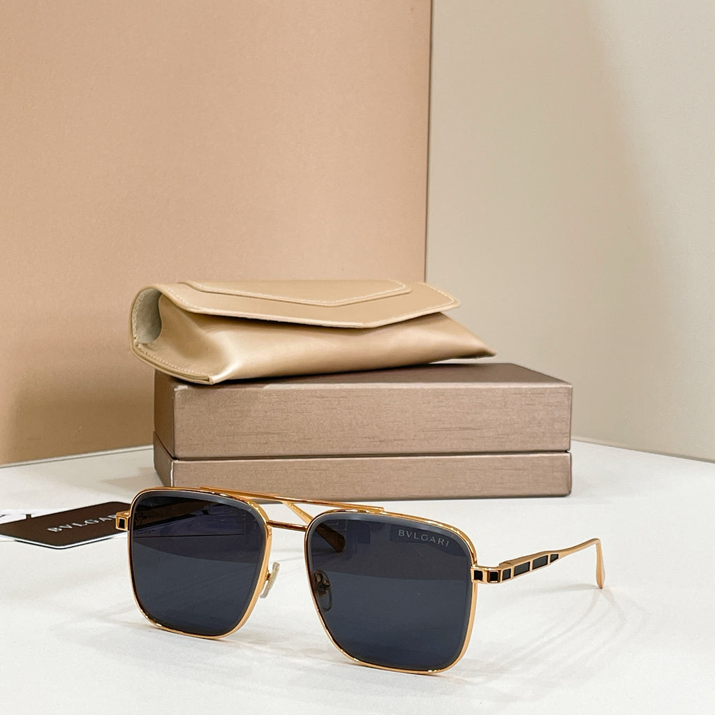 Bvlgari square sunglasses with gold-tone frame and dark blue gradient lenses