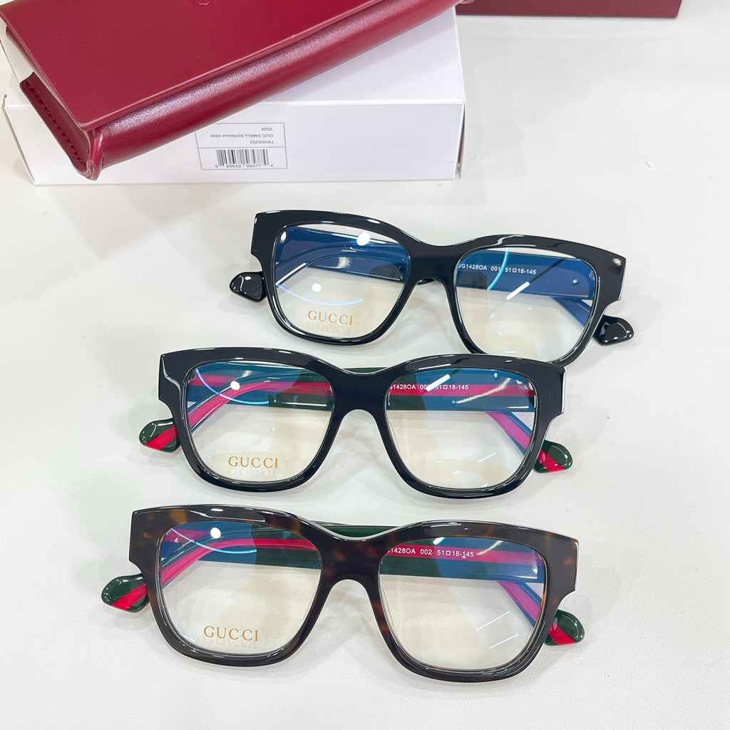 Gucci glasses set of three with black frames and multicolor temple stripe details