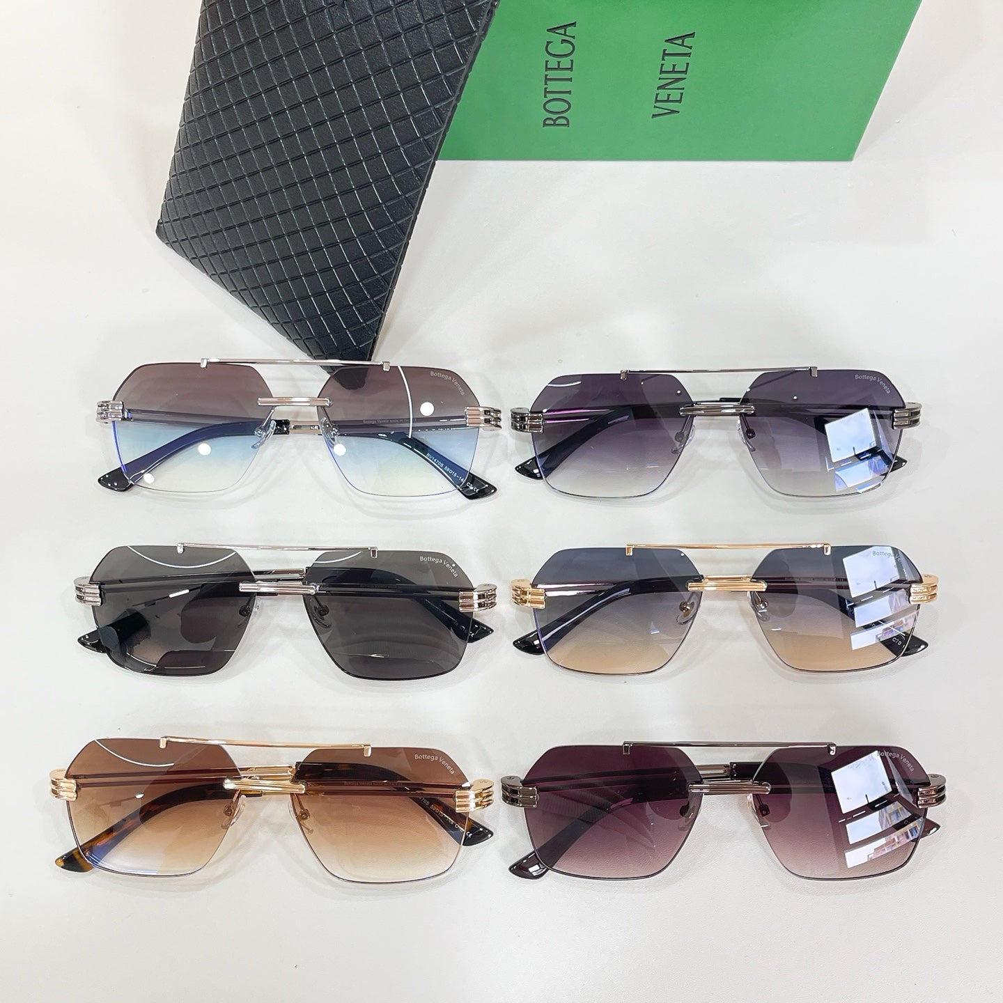 Bottega Veneta sunglasses set, multiple pairs with mixed colored lenses, with textured black case