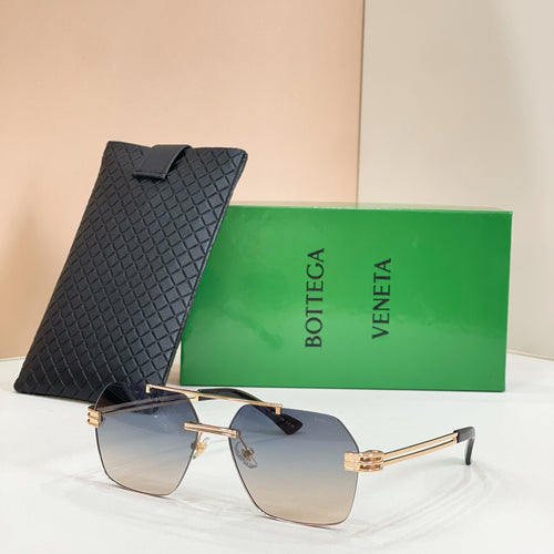 Bottega Veneta aviator sunglasses, gold-tone metal frame, gradient lenses, with textured black case