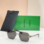 Bottega Veneta aviator sunglasses, gray gradient lenses, silver-tone frame, textured black case