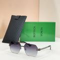 Bottega Veneta aviator sunglasses, metal frame, dark lenses, with textured black case